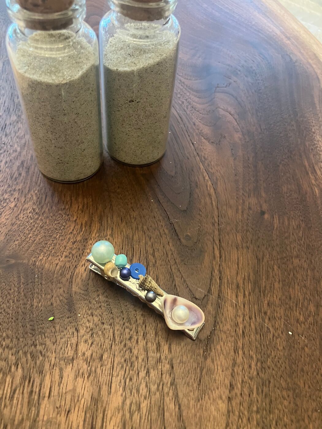 A dangly beaded strand on a hair clip