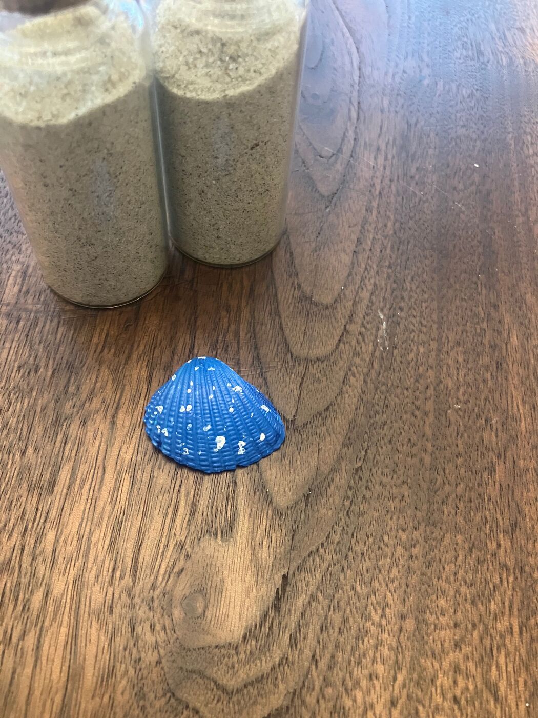 Bright blue shell with white polka dots
